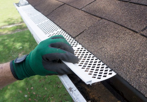 A technician installing Gutter Screens in Dunlap IL