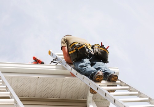 A man installing Gutter Guards in Morton IL