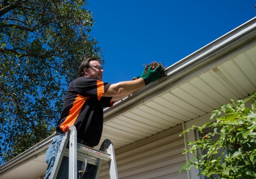 Professional performing Gutter Cleaning in Peoria IL